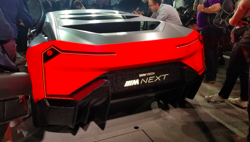 Illustration for article titled The 600 Horsepower BMW Vision M NEXT is BMW's Idea of a Hybrid Driver's Car of the Future